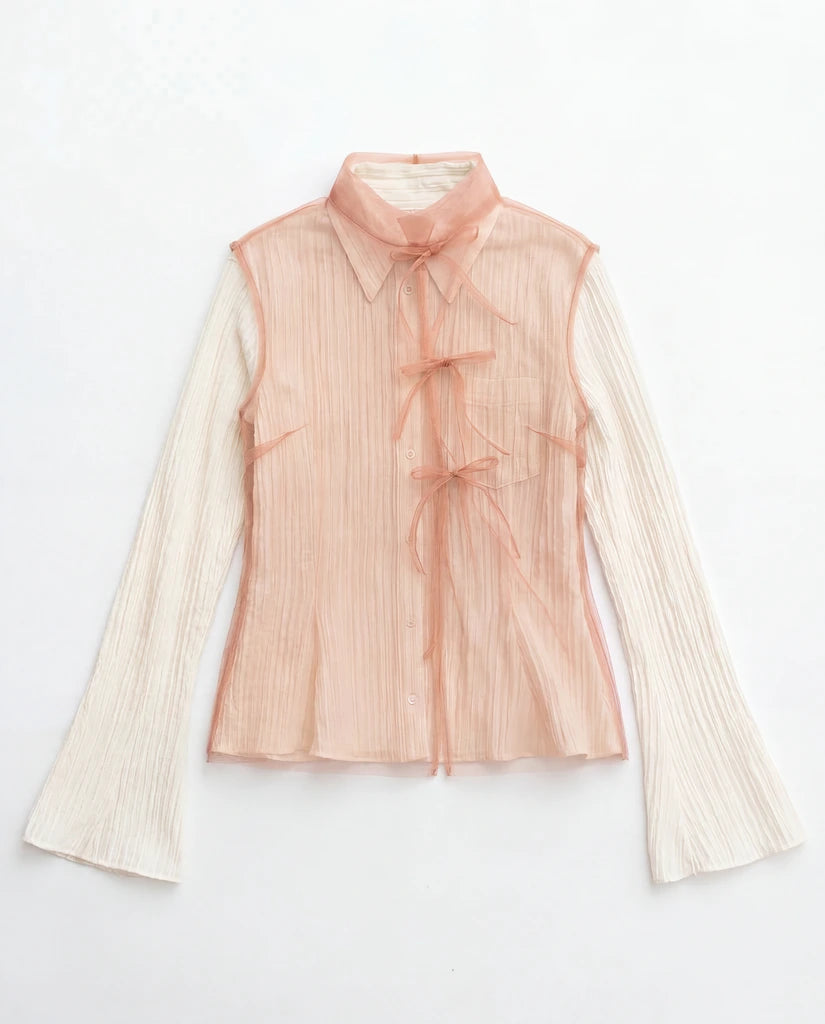 Top smanicato in tulle (luce)